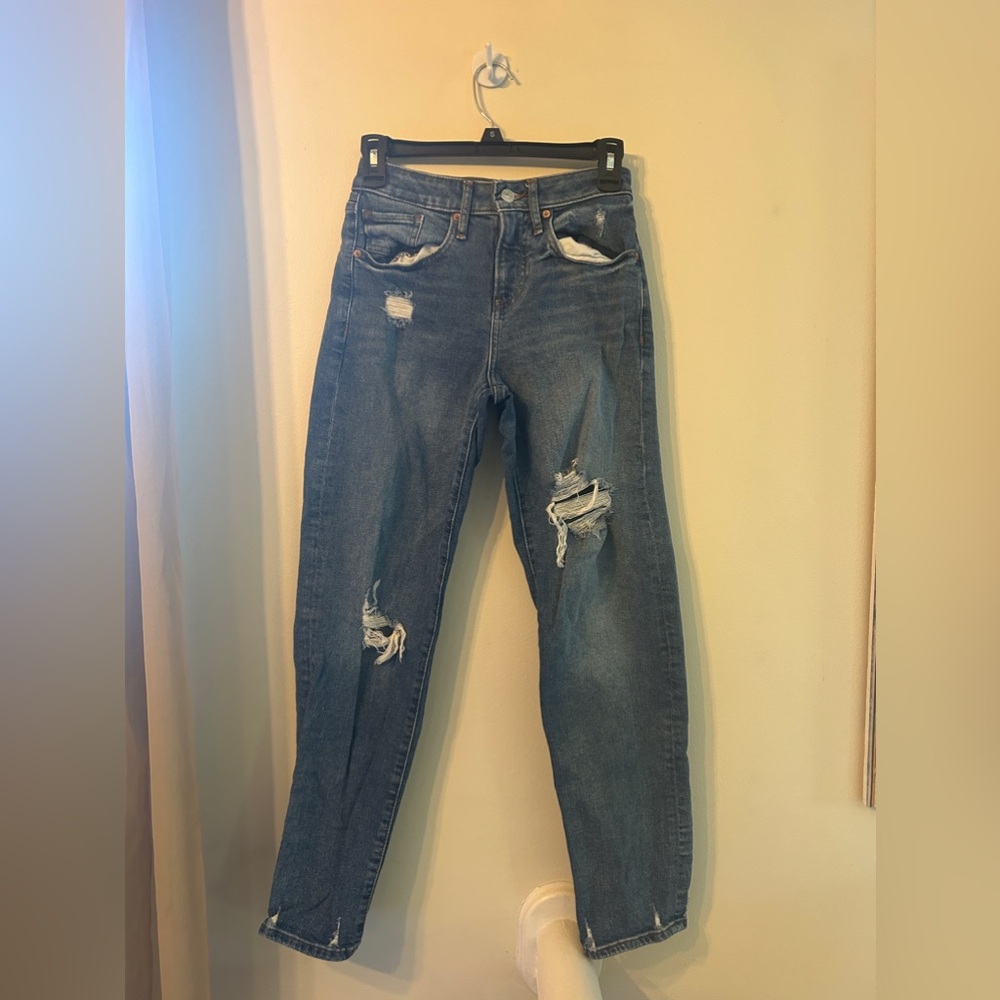 Dark wash jeans with rips